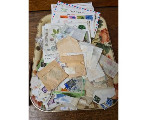 First Day Covers and a collection of British and world stamps.