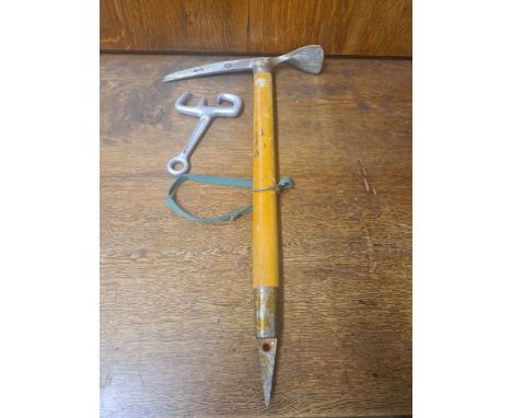 Vintage Grivel Courmayeur ice axe and a Pierre Allain Abseil device.