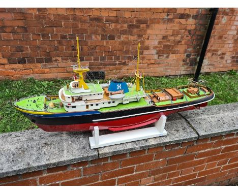 Zwarte Zee NR592 model motor tug, 44" long complete with remote control, workings in excellent condition.  Handbook and plans