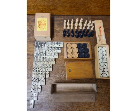Vintage bone and ebony 9 spot domino set, boxwood checkers, boxwood No. 2 size chess pieces and modern plastic domino set.
