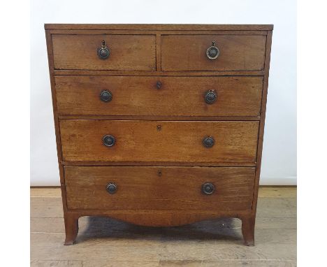 A 19th century mahogany and crossbanded chest having two short and three graduated long drawers on slightly splayed bracket f