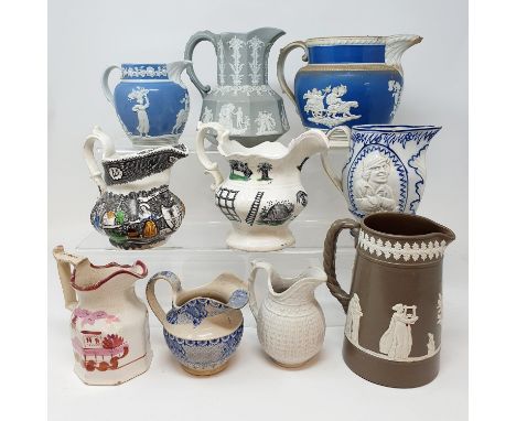 A 19th century Staffordshire jug, decorated with farming tools and animals, 15 cm high, nine other jugs, and a collection of 