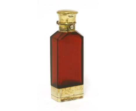 A Victorian silver gilt combined scent bottle/vinaigrette,by S Mordan, London, 1864,of upright rectangular form, with a push-