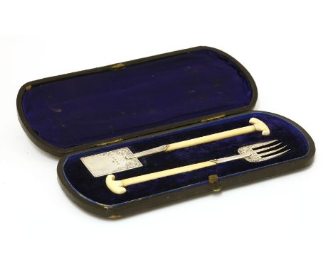 A late Victorian ivory-handled silver miniature spade and gardening fork,by George Unite, Birmingham, 1898,15cm long, in a fi