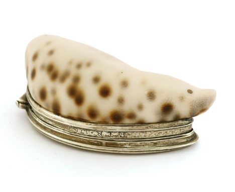 A mid-18th century unmarked silver-mounted cowrie shell snuff box,the rim edge engraved 'EIR 1769',the hinged cover/base set 