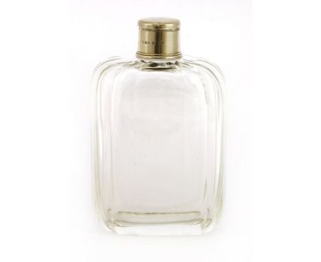 An unusual Victorian silver-topped and clear glass spirit flask,by T Johnson, London, 1879, also stamped with registration ma