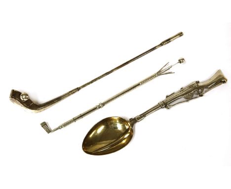 A novelty swizzle stick,Chester, 1909,in the form of a golf club and ball,a silver novelty rifle shooting frieze teaspoon,Hon