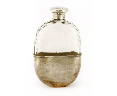 A late Victorian silver-mounted glass spirit flask,Sheffield, date 1895,engraved with a falcon crest,15cm highProvenance:  Th