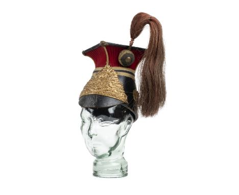 * Royal Lancers. An Edwardian Troopers lance cap, leather body, peak and crown with gilt metal fleur mounts, the upper sectio