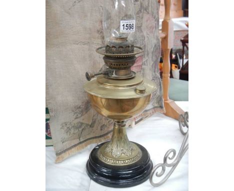 A brass oil lamp, COLLECT ONLY.