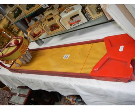 A vintage Chad Valley tin plate skittles game. COLLECT ONLY.