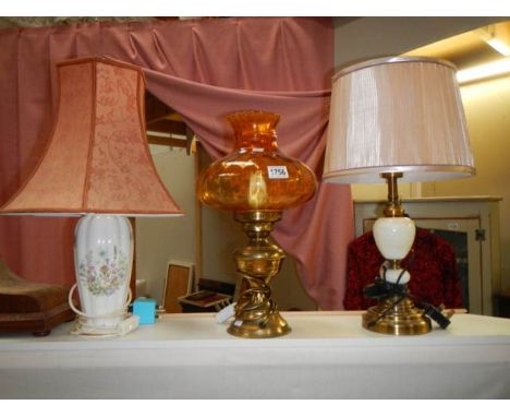 An Aynsley table lamp and 1 other plus a brass oil lamp style electric lamp with amber glass shade