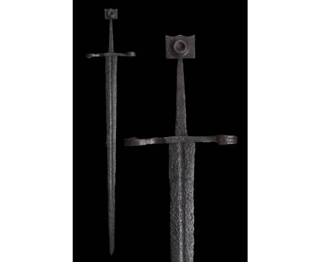 Ca. 1430-1470 AD. An excellent, forged-iron long sword with narrow and thin blade with a shallow fuller running from the cros
