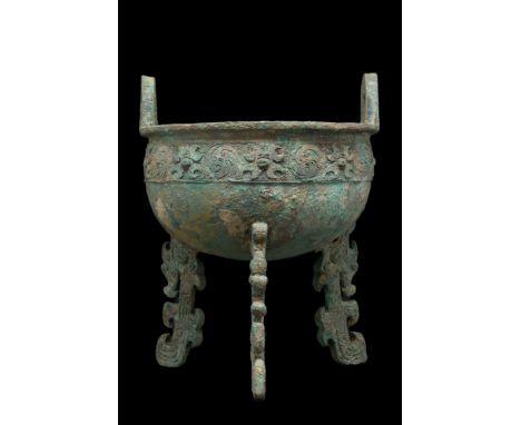 Late Shang/Early Western Zhou Dynasty, ca. 12th-11th century BC. Cast in relief with taotie masks and leiwen, on three bird-s