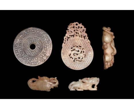 A lovely collection of hardstone bi discs (2) and zoomorphic beast carvings (3). Bi disc are some of the most fascinating dec