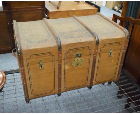 A wooden bound canvas trunk