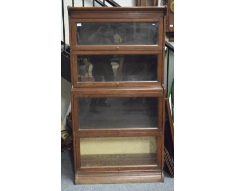 An oak Globe Wernicke type stacking bookcase, together with elements from a further bookcase