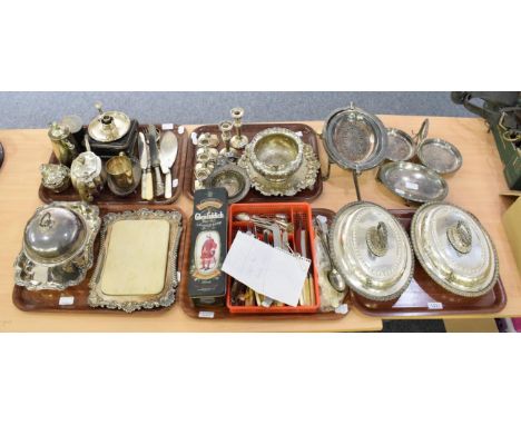A collection of silver plate including a breakfast dish, a pair of entree dishes, a bread board, flatware, tea wares, etc