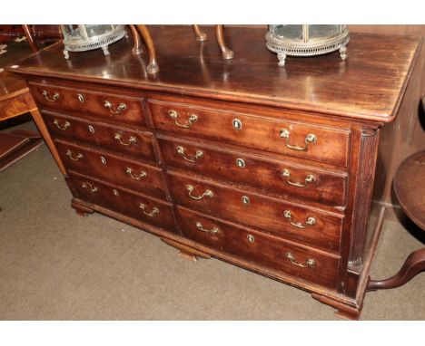 A late George III mahogany mule chest with four dummy drawers and four real drawers, on bracket feet
