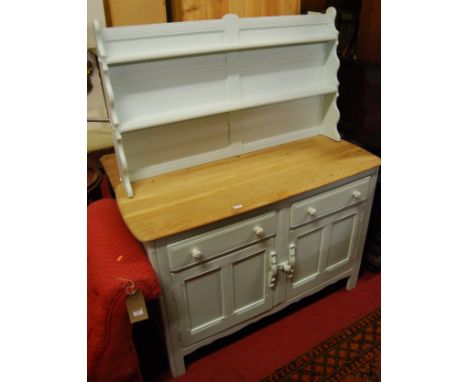 An Ercol partially stripped and repainted dresser, w.122cm