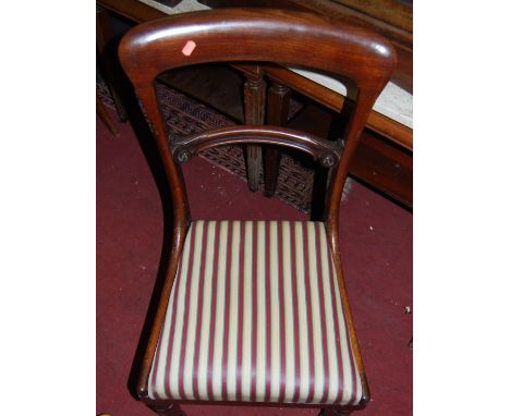 A set of three Victorian mahogany balloon back dining chairs, having striped upholstered drop-in pad seats; together with an 