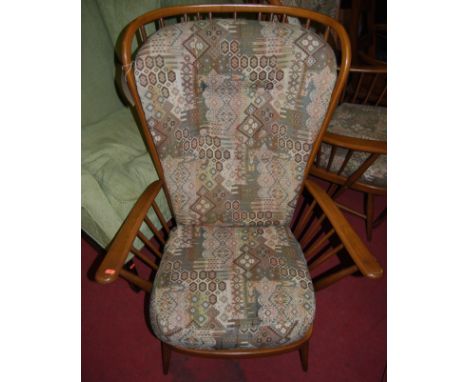 A pair of Ercol mid-elm stickback armchairs, each having Kelim style upholstered cushions