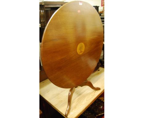 A reproduction mahogany circular pedestal low tilt-top tripod occasional table, dia. 75cm