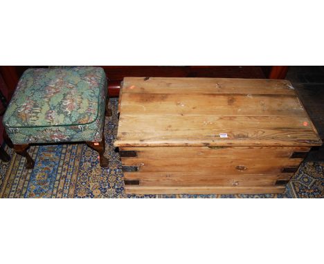 A late 19th century planked pine and metal bound hinged top tool chest, having end carry handles, w.91cm