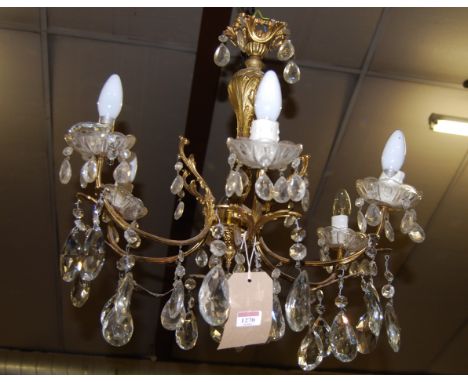 A gilt metal and cut glass crystal drop six light hanging electrolier, approx drop 60cm