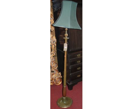 A green painted turned-wood standard lamp
