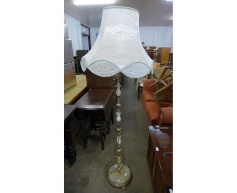 A brass and onyx standard lamp 