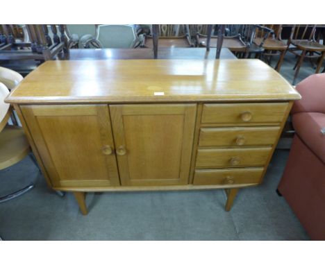 A light oak sideboard 