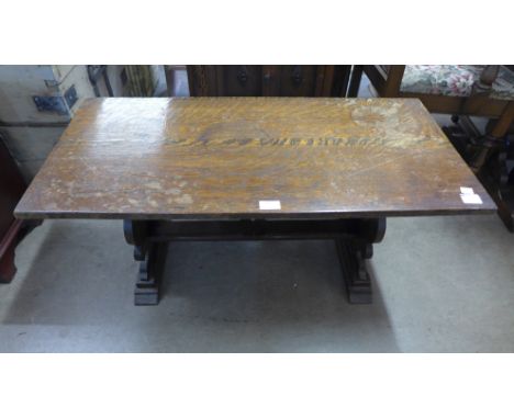 An oak coffee table, two vintage travel trunks, etc. 