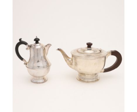 with a scroll handle, a turned finial and a "Celtic" border around the lower body, by Charles C Green &amp; Co. Ltd, Birmingh