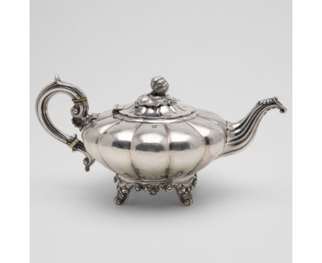 of melon fluted form, with a strawberry finial, a 'C'-scroll handle and raised on decorative feet, crested, by James Fray, Du