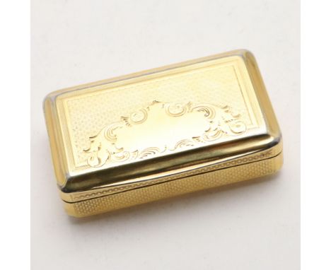 of rectangular form, the cover engraved with a vacant scroll cartouche, the body with engine-turned decoration, marked "13" o