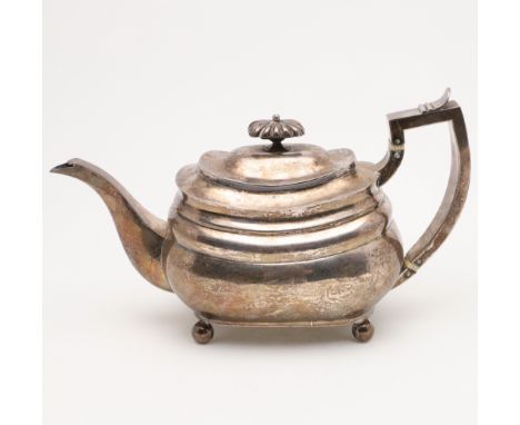rounded oblong form, with a cushion finial and on four ball feet, by Samuel Whitford or Wheatley, London 1811; 12.25" (31cm) 