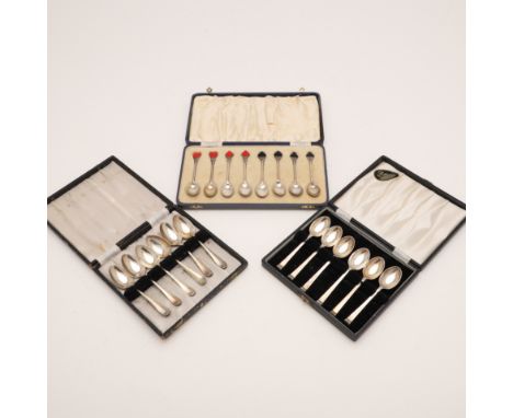 a set of eight, with enamelled French suits at the terminals, by Turner &amp; Simpson, Birmingham 1937, a set of six Hanoveri