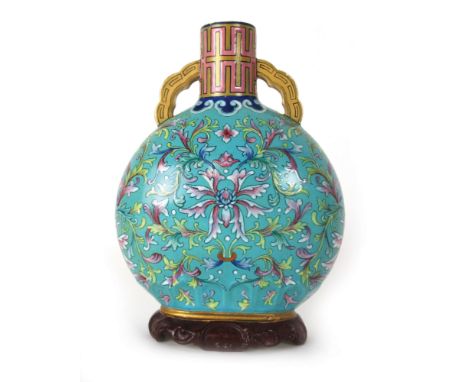 A 19th century Royal Worcester vase of moon flask form florally decorated in the Aesthetic Movement manner, dated '71, h. 20 