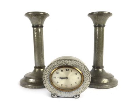 A Liberty & Co 'Tudric Pewter' hammered pewter mantle clock No. 01590, engraved to back 'From the St James M.U.' together wit