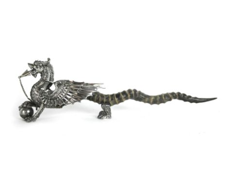 A Victorian silver plated and antelope horn table cigar lighter in the form of a dragon with a raised front leg by Walker & H