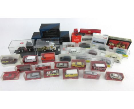 A collection of miniature vehicles, to include Herpa, Busch, Rietze Automobile 1:87 scale models and a others (qty) 