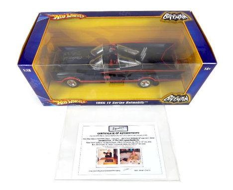 A limited edition boxed Danbury Mint signed Mattel 1966 TV Series Batmobile, signed by Adam West and Burt Ward, complete with