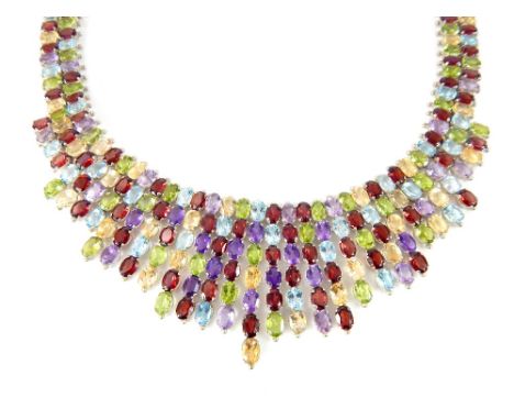 Contemporary designer choker necklace, multi stone arrangement of amethyst, garnet, peridot, citrine and blue topaz, set in s