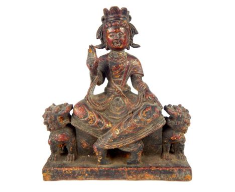 Chinese gilded cast iron statue of Guanyin, seated upon a plinth & guarded by two temple lions, 24x 20cm