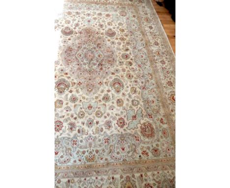 A large 20th century beige ground silk ground carpet, embroided with flowers, 248 x 330cm 