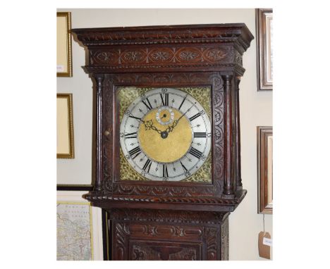 Late 18th Century brass square dial longcase clock, case with later carved decoration, 195cm high Condition: Some signs of ol