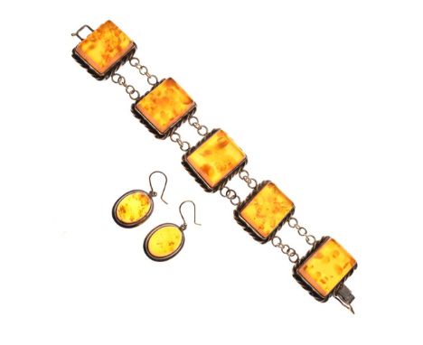 Silver bracelet having five rope-edged amber-coloured panels between belcher links, each panel approx 24 x 17 x 8mm, total le