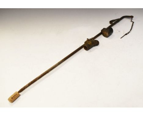 Vintage keepers alarm, cast and wrought iron, stem with cast-iron weight and hinged trap, 12 bore blank cartridge container a