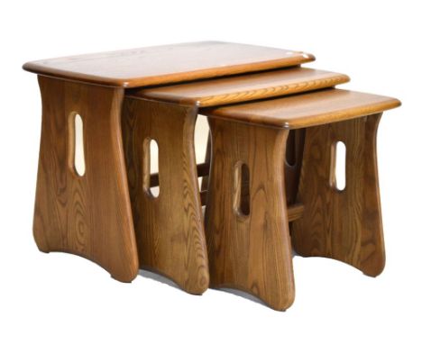 Ercol Golden Dawn nest of three tables, largest measuring 45cm high x 63cm wide Condition: Light scratches present in places,